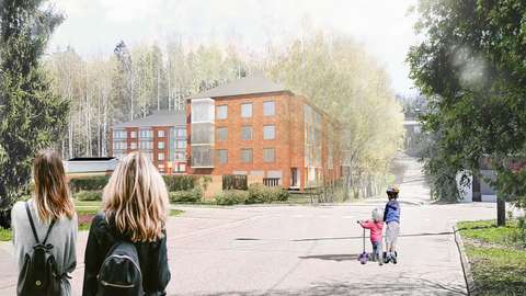 There is a four-storey block of flats at the street corner.