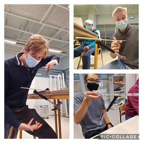 Opiskelijat kokeilevat fysiikan lakeja.