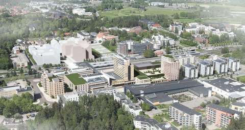 Ilmakuvan keskellä kohoava korkea tornitalo on Espoontorin kauppakeskus. Sen molemmin puolin näkyy suunniteltuja matalampia rakennuksia.