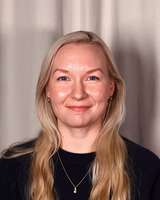 Riina Kujanpää kasvokuva.