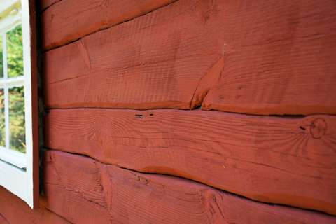 Red log wall