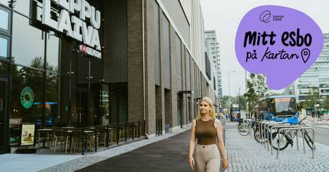 En person går utanför Lippulaiva köpcentrum. Dessutom Esbos logo och texten Mitt Esbo på kartan.