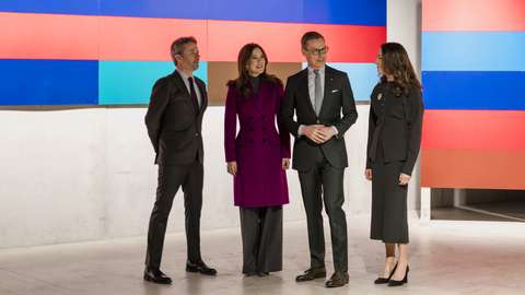 The Danish royal couple and the Finnish presidential couple in front of Poul Gernes artwork.