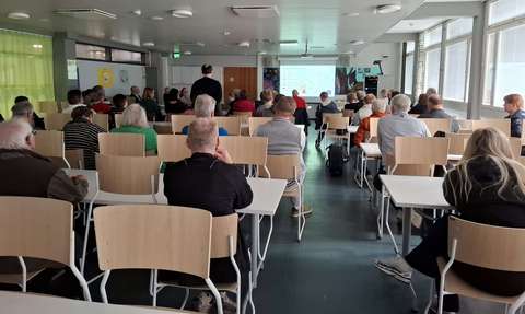 Participants discussing the plan in the dining hall of Kaitaa lower secondary school.