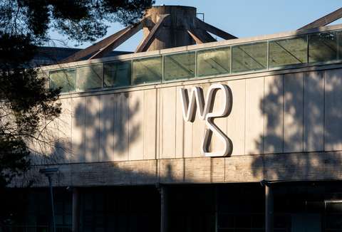The facade of the WeeGee house, with letters W and G on the wall.