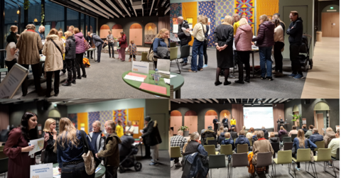 Participants discussing at the tables and listening to the presentation.