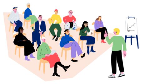 Piirroskuva, jossa isossa tilassa kolmessa rivissä istuu eri-ikäisiä ja erilaisia ihmisiä kuuntelemassa edessä seisovaa miestä.Takana paperitaulu, johon piirretty ylöspäin osoittava käyrä. 