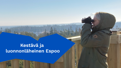Henkilö katsoo kiikareilla lintutornissa, kuvan päällä teksti "Kestävä ja luonnonläheinen Espoo".