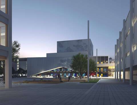 Havainnekuva vaaleasta matalahkosta rakennuksesta iltahämärässä. 