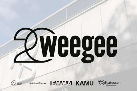 WeeGeen 20-vuotislogo harmaata taustaa vasten.