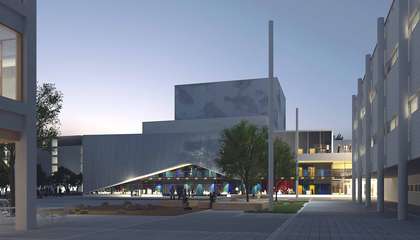 Havainnekuva Espoon kulttuurikeskuksen aukiosta kaakosta, jossa näkyvät aukion avarat tilat, istutusalueet ja ympäröivät rakennukset.